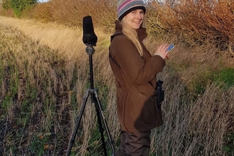 Amy Trewick outside in grass