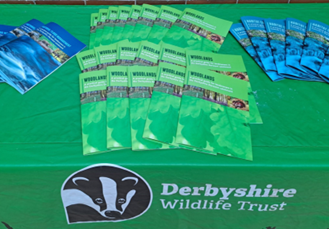 A table of leaflets at Wooded Habitat Creation Workshop at Darley Dale 